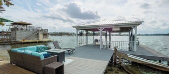 Lakefront Escape Large Dock, Swings, Screened Porch and Stunning Sunset Views