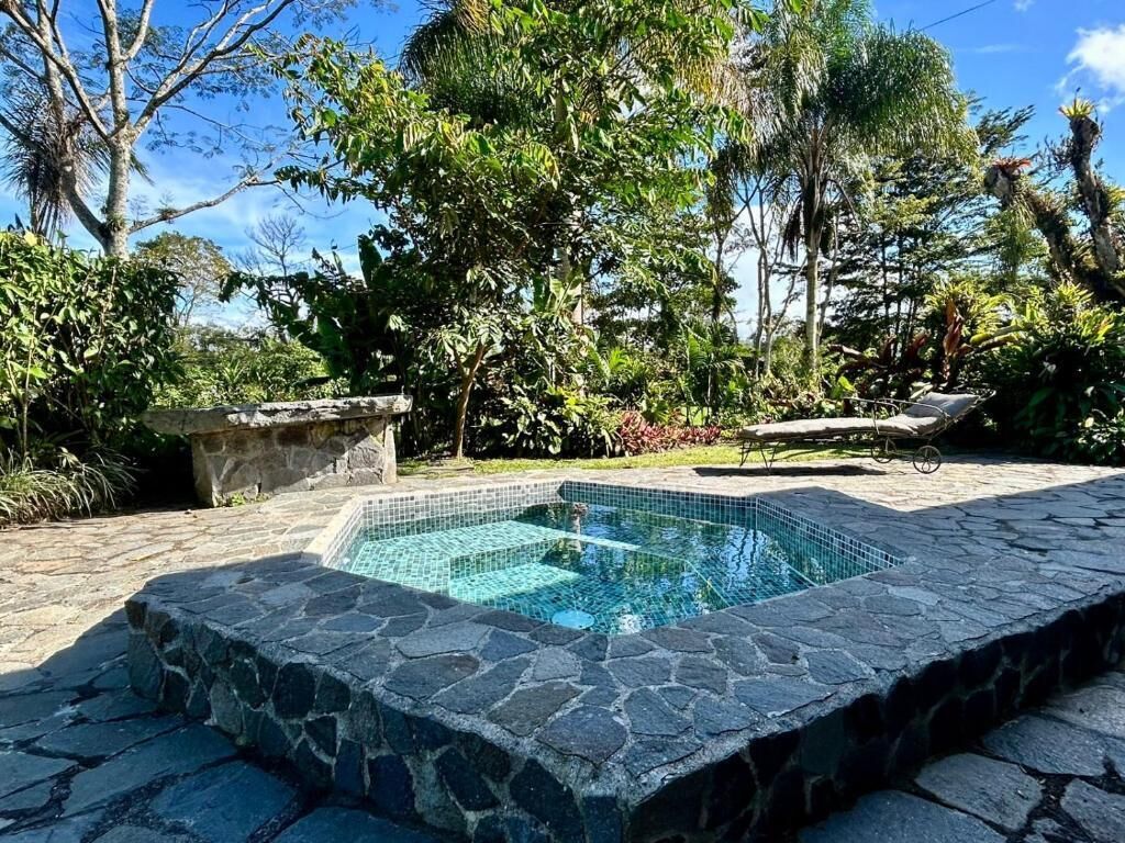 Deluxe tweepersoonskamer, uitzicht op tuin | Terras