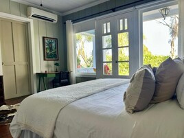 Quarto casal luxo, vista para o jardim