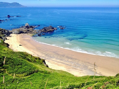 Comfortable, sunny, apartment, just steps to the beach!