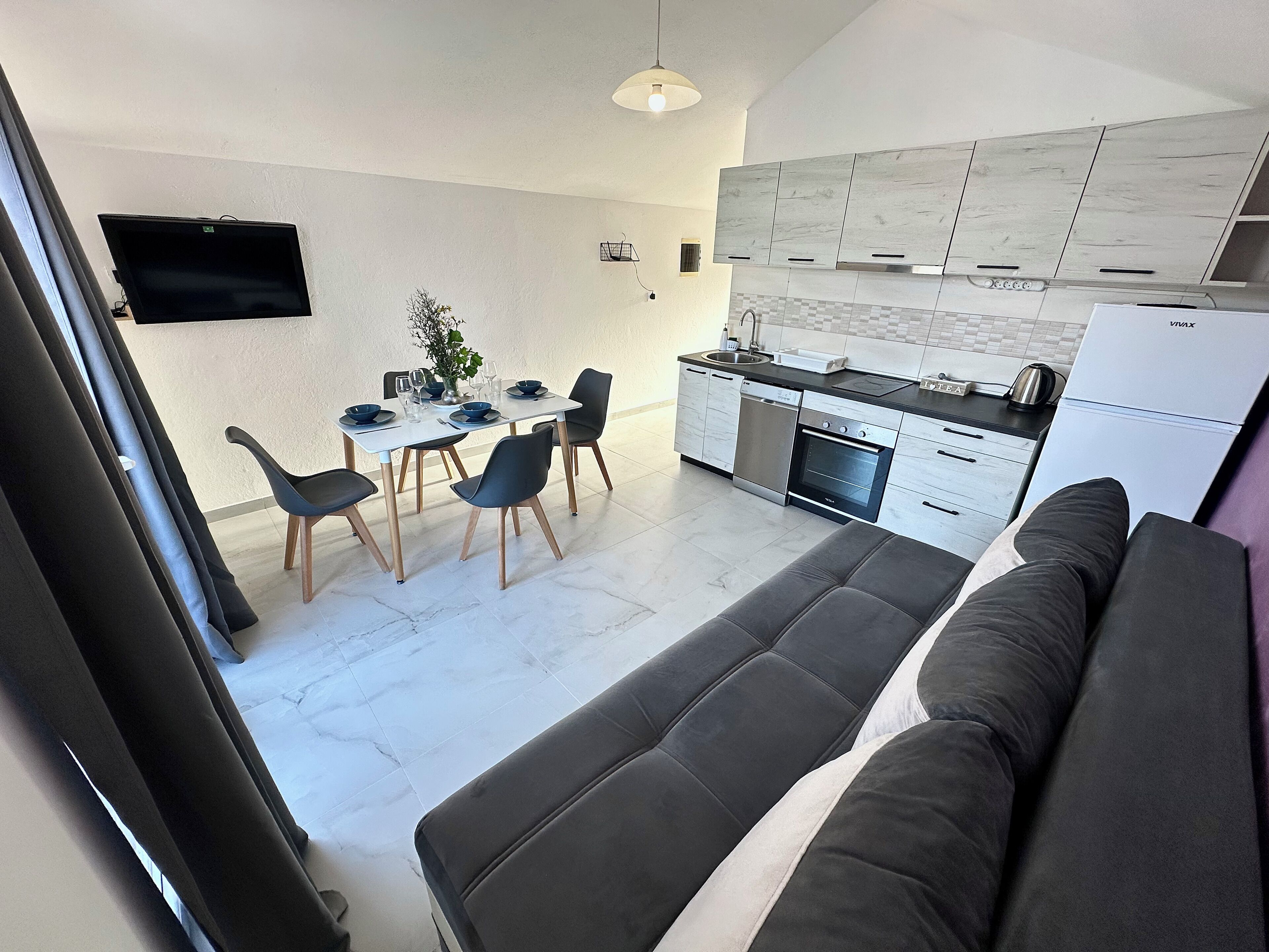 Luxury Apartment, Sea View | Living area | TV