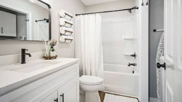 Hair dryer, towels, soap, shampoo