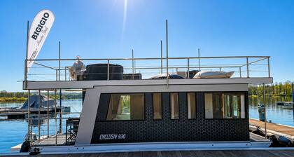 Neon House Boat—Luxury Stay on Lake Maggiore with a Hot Tub