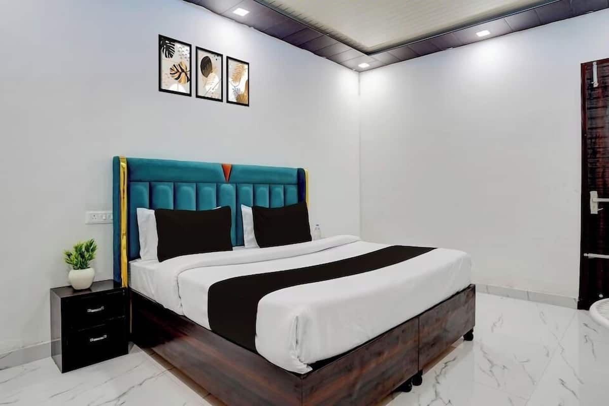 Deluxe dubbelrum - utsikt mot staden | Sängtillbehör av högsta kvalitet, Select Comfort-madrasser och skrivbord