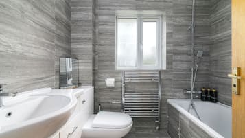 Hair dryer, towels, soap, toilet paper