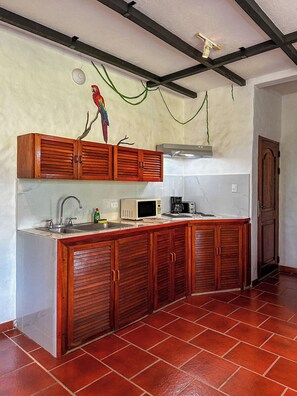Comfort Apartment, Kitchen, Sea View | Private kitchen | Microwave, stovetop, cookware/dishes/utensils - Ocean Vista Tamarindo (Tamarindo)