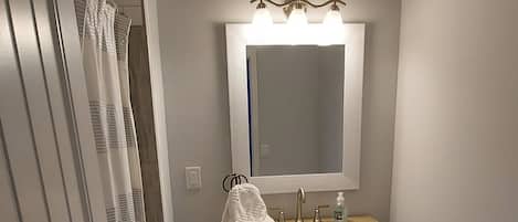 Shower, jetted tub, hair dryer, towels