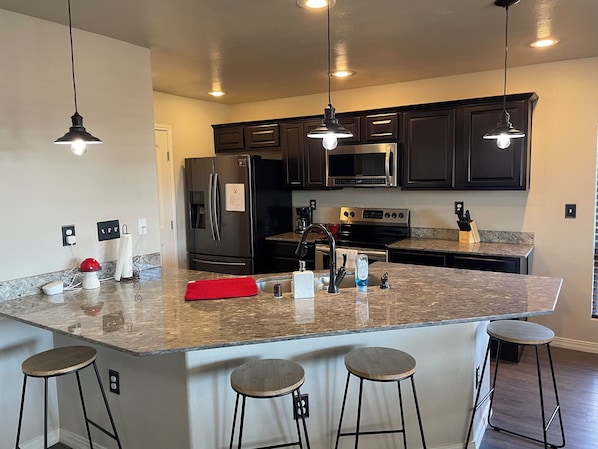 Fridge, microwave, oven, stovetop - Your Home Away From Home-3 Bedrooms, 2 Baths. (Hobbs)