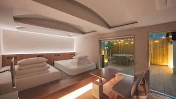 Premium bedding, down comforters, pillowtop beds, in-room safe