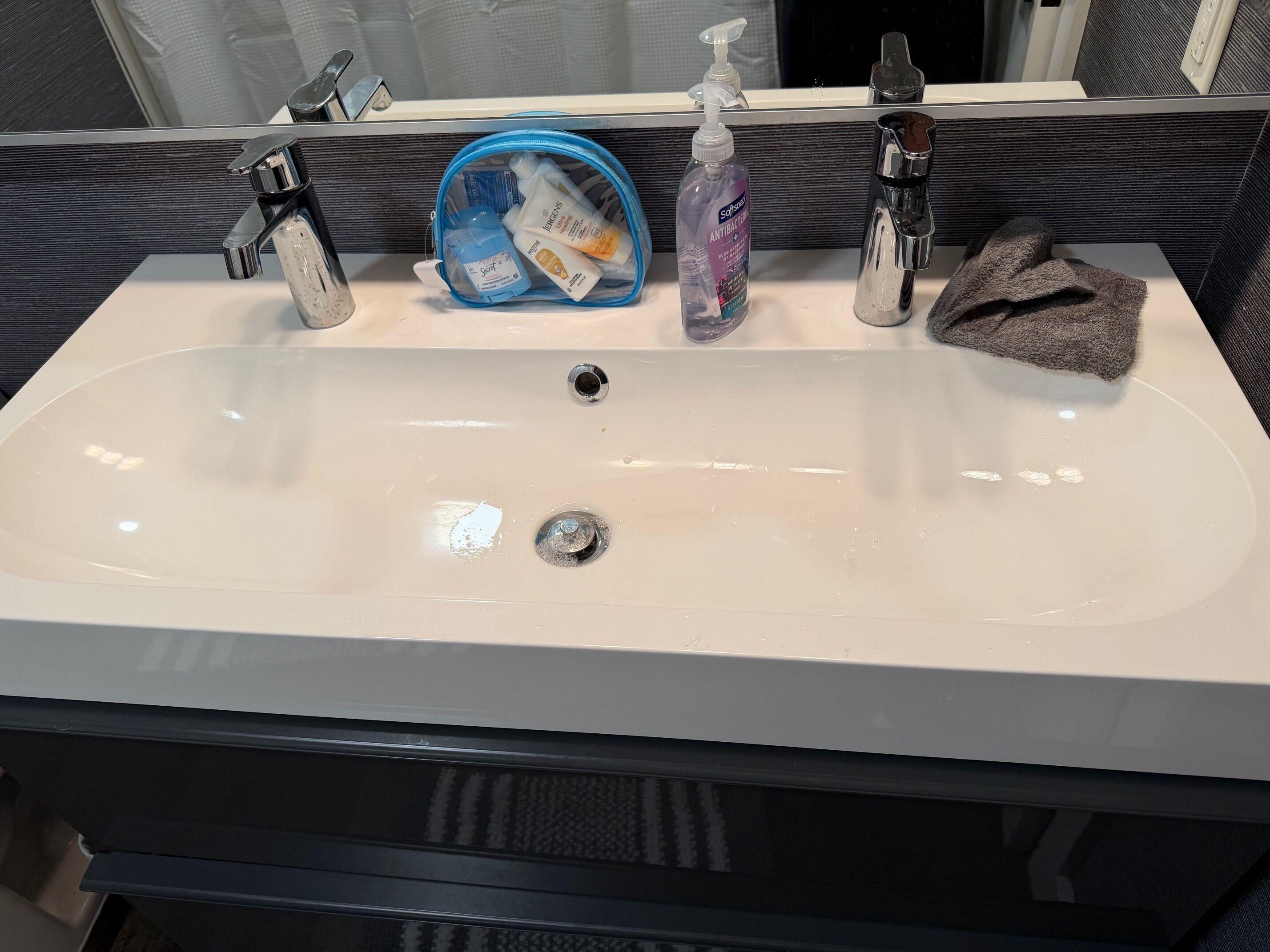 Hair dryer, towels, soap, toilet paper