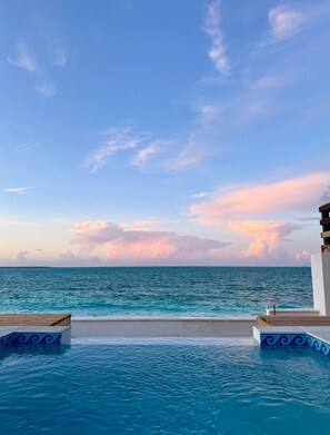 Outdoor pool, a heated pool - A High End beachfront 3 bedroom/3 bath with vanishing edge pool on Tar Bay (Exuma)