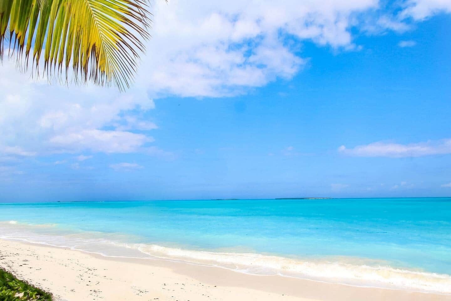 On the beach, sun loungers, beach towels