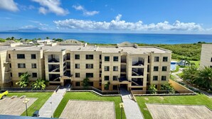 A multi-story hotel with a view of the ocean. - Seaview Garden Hotel & Residences (Basseterre)