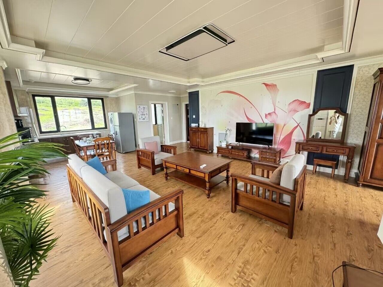 55-inch flat-screen TV with digital channels, Netflix