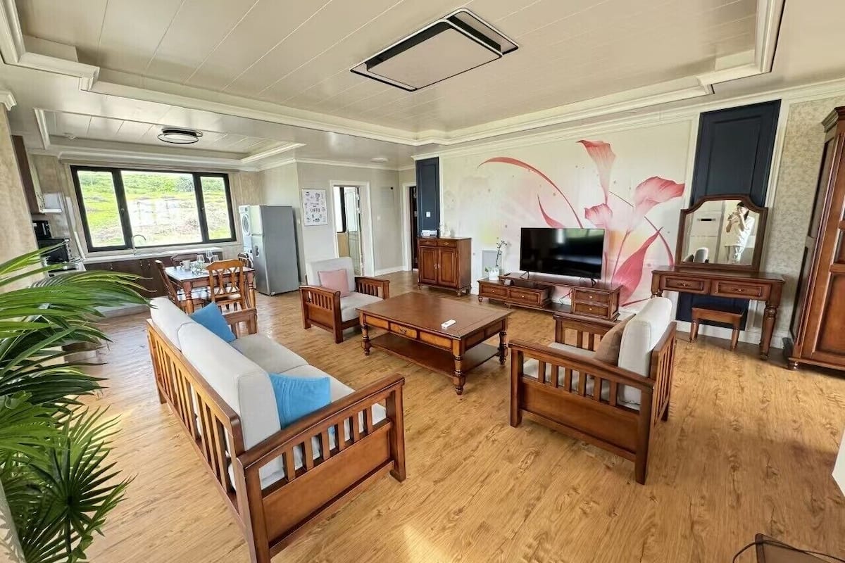 55-inch flat-screen TV with digital channels, Netflix