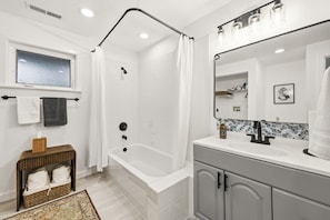 Jetted tub, hair dryer, towels, soap