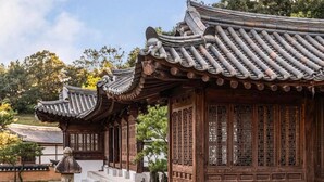 Traditional Korean-style buildings with tiled roofs and wooden structures. - Rakkojae Hahoe Hanok Hotel  (Andong)