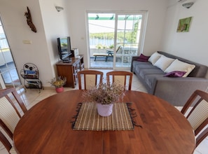 House (Two Bedroom Villa with Sea view) | Living room | 32-inch flat-screen TV with cable channels - Holiday Home Mirta (Sali)