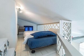 Family Apartment, Multiple Bedrooms (Tiffany With Shared Pool) | 1 bedroom, iron/ironing board, free WiFi, bed sheets - Tiffany With Shared Pool (Olbia)