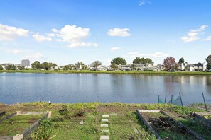 House, 3 Bedrooms, Patio, Lake View | Property grounds - Lakefront Retreat  WaterViews 3BR 1.5BA  (San Mateo)