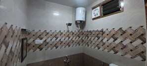Apartamento Premium | Baño | Ducha, toallas, jabón y champú