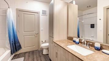 Hair dryer, towels, soap, toilet paper