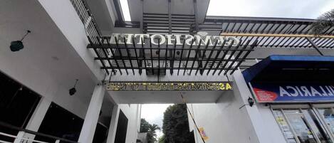 A building entrance with a sign that reads "CENTRAL".