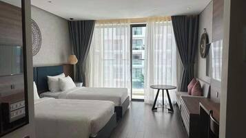 In-room safe, desk, laptop workspace, blackout curtains