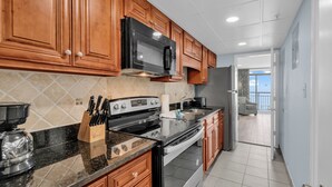 Signature Condo, 1 Bedroom, Balcony, Ocean View | Private kitchen | Coffee/tea maker, fridge, microwave, oven - Landmark Resort Condos (Myrtle Beach)