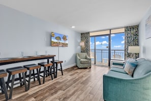 Signature Condo, 1 Bedroom, Balcony, Ocean View | Living room | 40-inch Smart TV with digital channels - Landmark Resort Condos (Myrtle Beach)