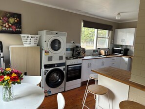 Fridge, microwave, oven, stovetop - Charming 3 Bedroom Home in Garran, Perfect for Families and Groups (Garran)