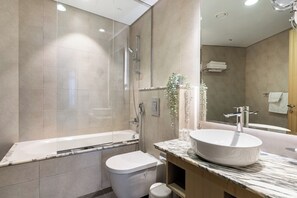 Hair dryer, towels, soap, toilet paper - Elegant 1BR Apartment, Rooftop 360° Infinity Pool with Burj Views (Dubai)