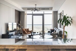 Living area - Elegant 1BR Apartment, Rooftop 360° Infinity Pool with Burj Views (Dubai)