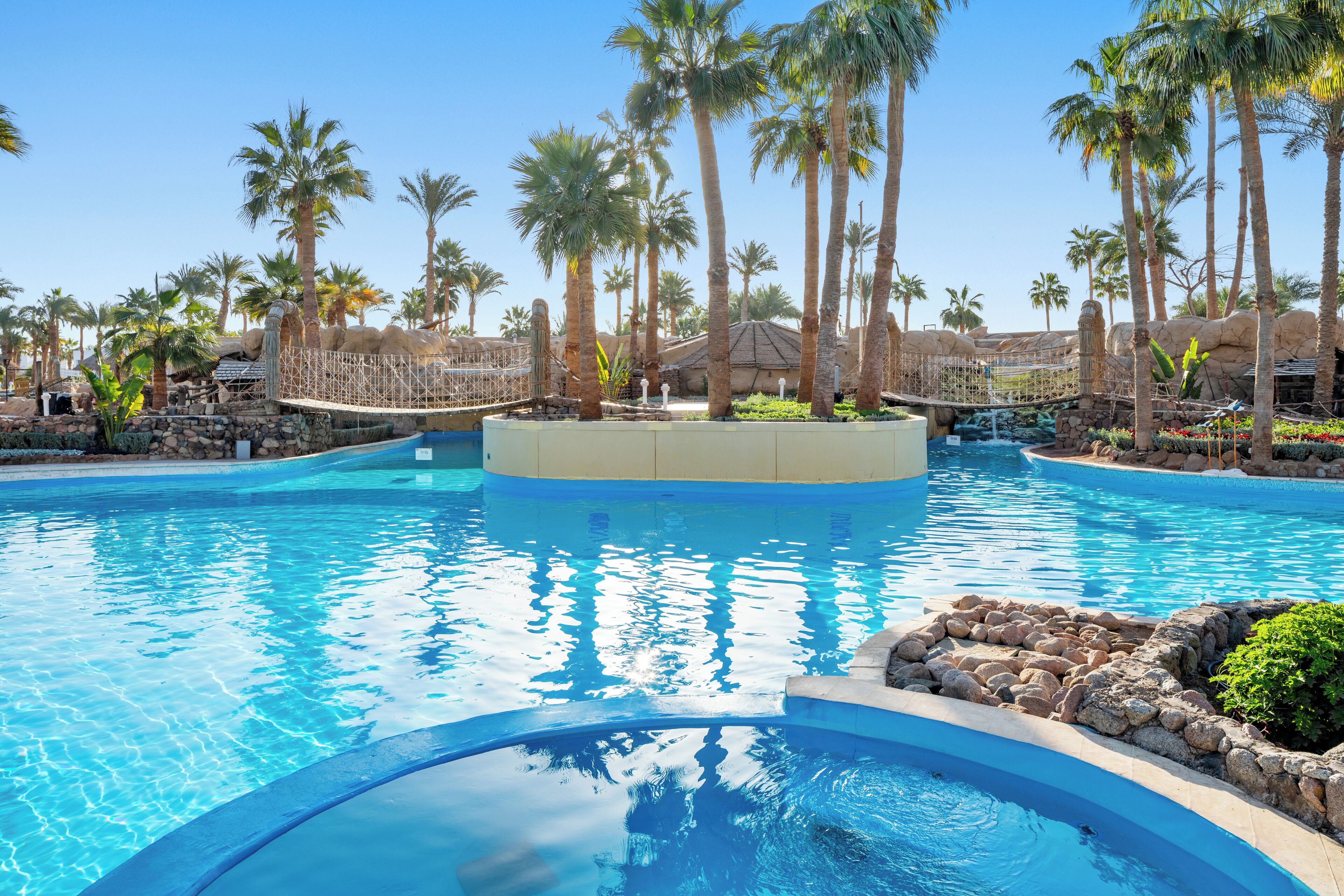 2 outdoor pools, open 9:00 AM to 5:00 PM, pool umbrellas, pool loungers