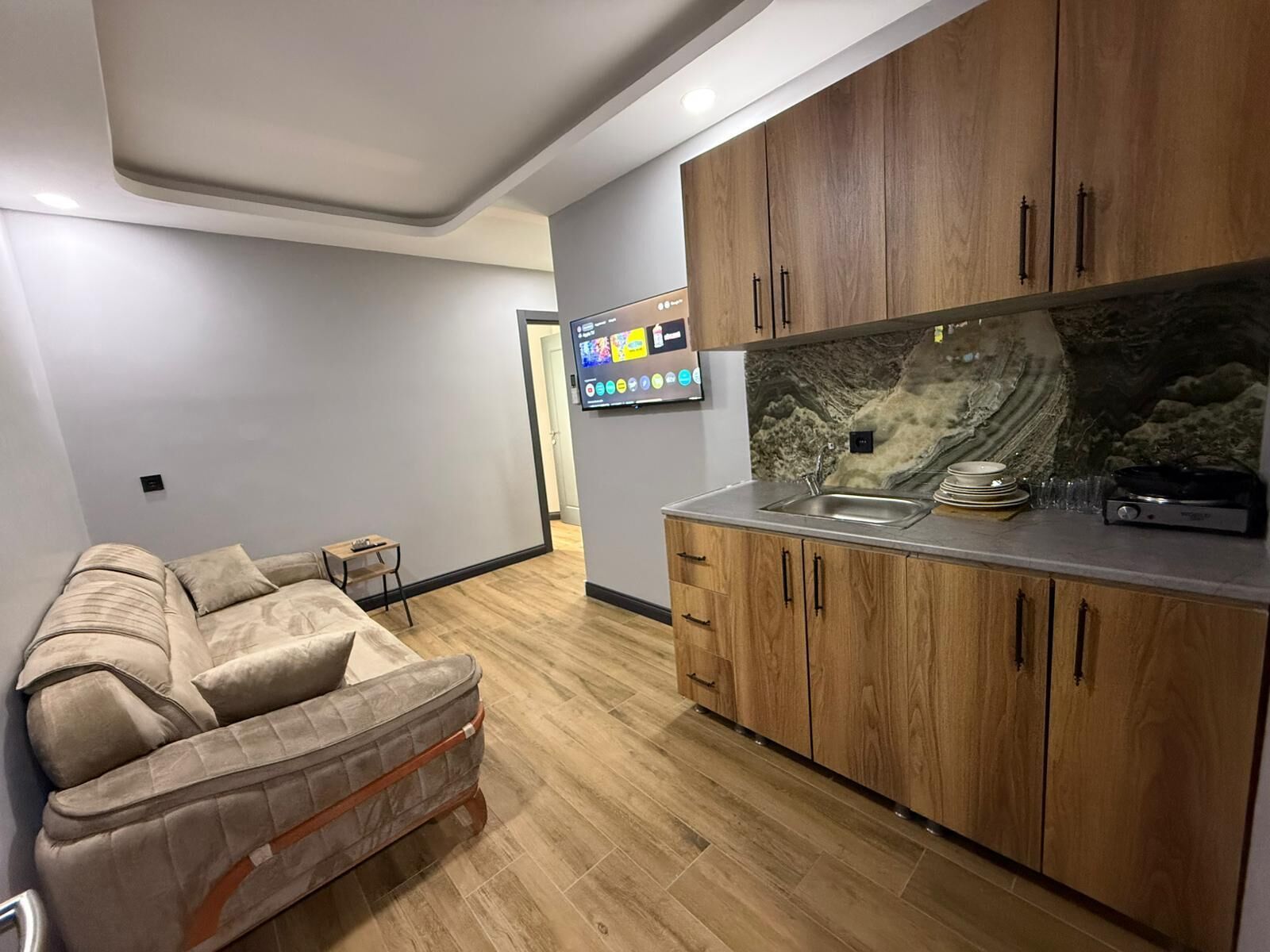 Family Room, City View | Private kitchen | Fridge, electric kettle