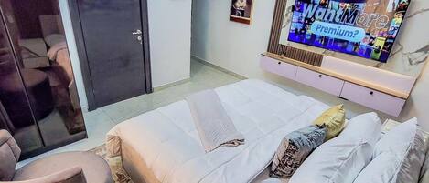 Family Apartment, Balcony, City View | Desk, laptop workspace, blackout drapes, soundproofing
