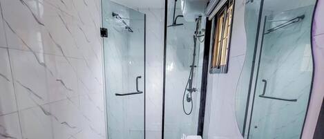 Family Apartment, Balcony, City View | Bathroom | Free toiletries, hair dryer, towels, soap