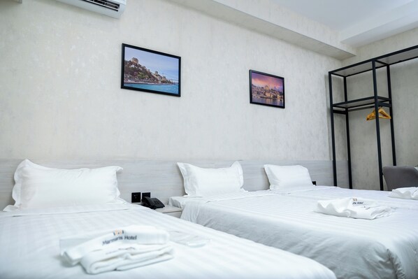 Standard Triple Room | Premium bedding, down duvets, minibar, in-room safe - Marmaris Saray Hotel (Tashkent)