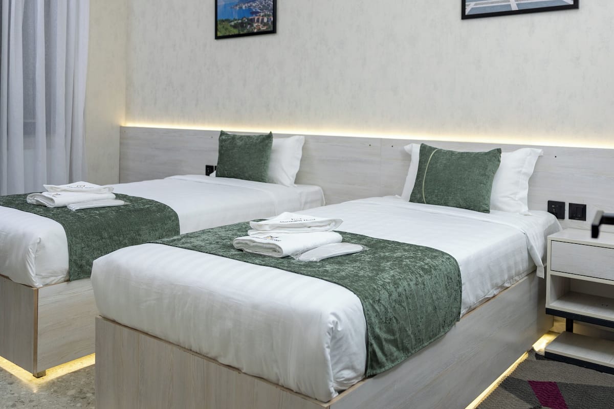 Phòng | Bộ đồ giường cao cấp, chăn bông, minibar, két bảo mật tại phòng