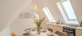 Großzügige Dachgeschoss-Suite
3 Schlafzimmer Küche & Essbereich