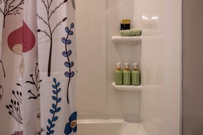 Shower, hair dryer, bidet, towels - The Enchanted Green - 3 Kings 1 Queen Home in Downtown Wake Forest! (Wake Forest)