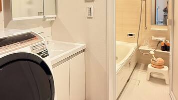 Hair dryer, towels, soap, shampoo