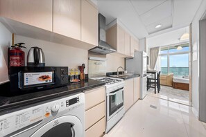 Fridge, microwave, oven, stovetop - Free housekeeping visits during your stay - StayShort - Cozy Studio in DAMAC Hills that Sleeps 2 (DAMAC Hills)