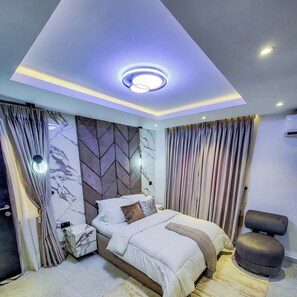 Deluxe Room, Balcony, City View | Desk, laptop workspace, blackout drapes, soundproofing - Tafetta Boutique Hotel  (Abuja)