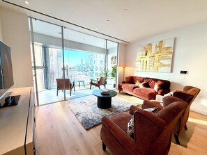 Luxury Apartment, Balcony, City View | Living area | 42-inch flat-screen TV with digital channels, Netflix