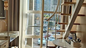 Superior Loft | Blackout drapes, iron/ironing board, free WiFi, bed sheets