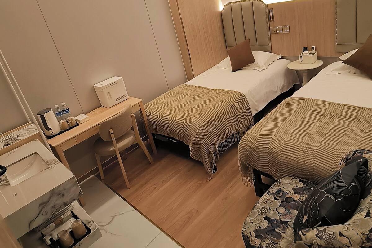 Classic Twin Room | Blackout drapes, iron/ironing board (on request), WiFi (free)
