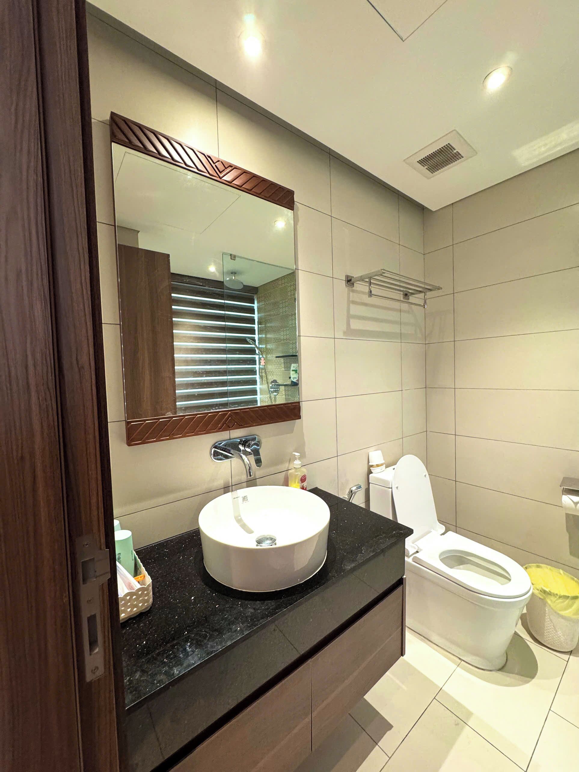 Shower, hair dryer, slippers, towels
