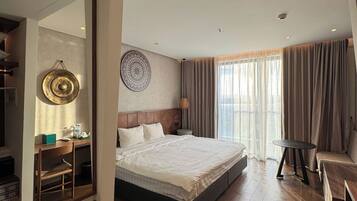 Standard Studio, Partial Ocean View | In-room safe, desk, laptop workspace, blackout curtains