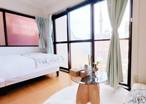 2 chambres, coffres-forts dans les chambres, fer et planche à repasser
